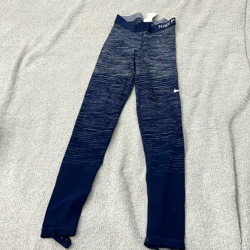Nike pro- fleece tights, pre loved but lightly worn- great condition size: med